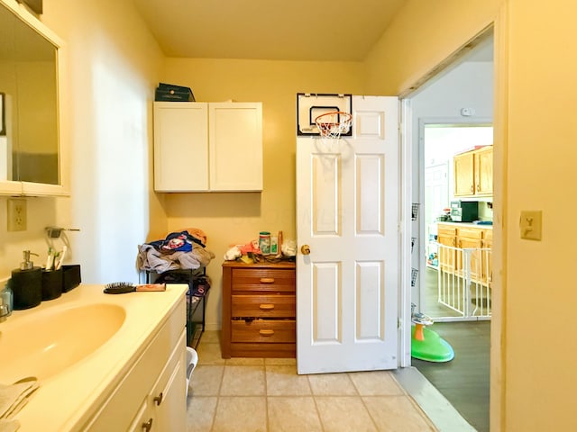 bathroom featuring tile patterned floors and vanity