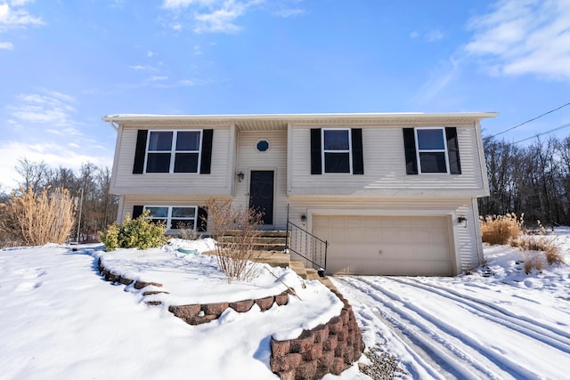 split foyer home featuring a garage