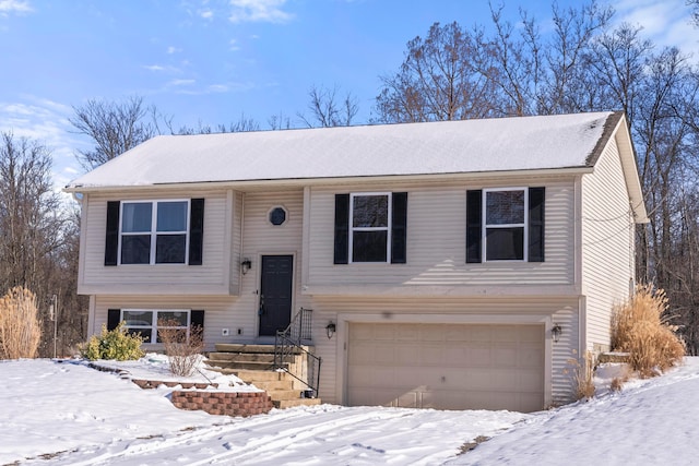 bi-level home featuring a garage