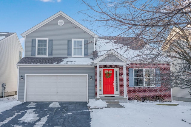 front facade with a garage