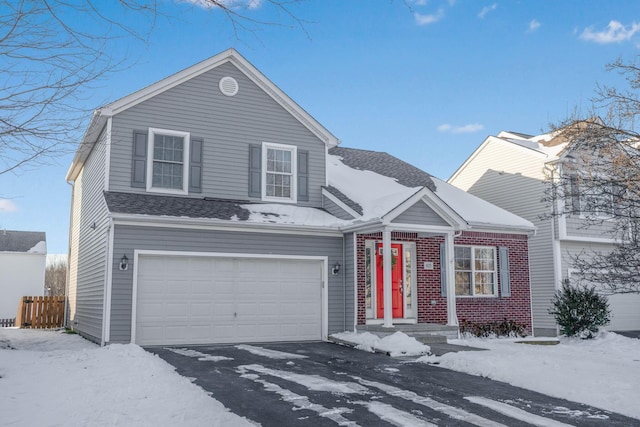 front of property with a garage