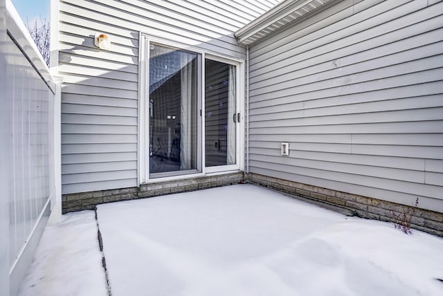 view of snow covered patio