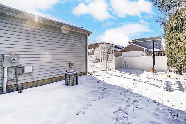 view of yard covered in snow