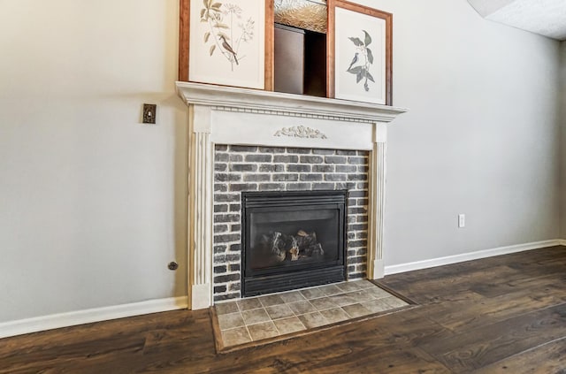 details with wood-type flooring and a fireplace