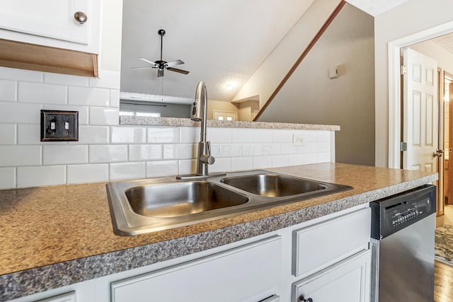 kitchen featuring white cabinetry, sink, decorative backsplash, and dishwasher