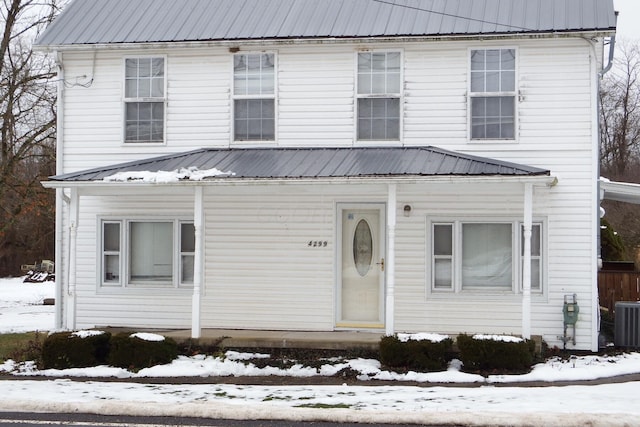 view of front of home featuring cooling unit