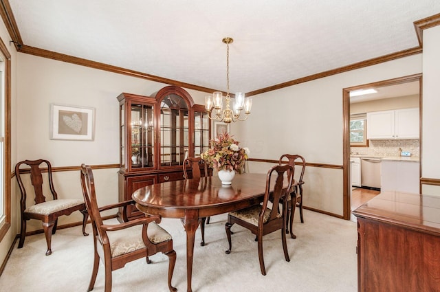 dining area with crown molding, light colored carpet, and a chandelier