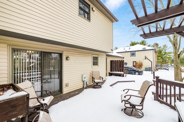 view of snow covered deck