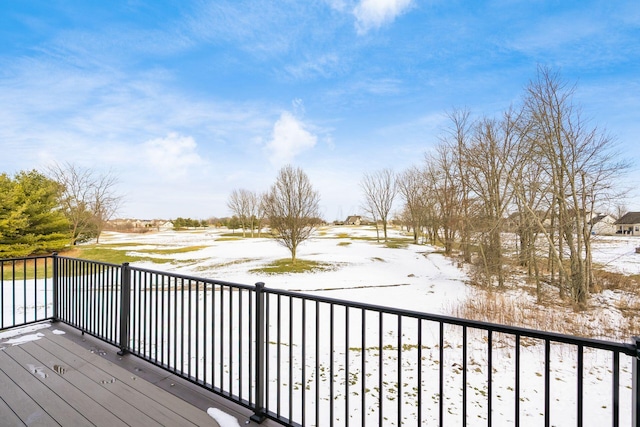 view of snow covered deck