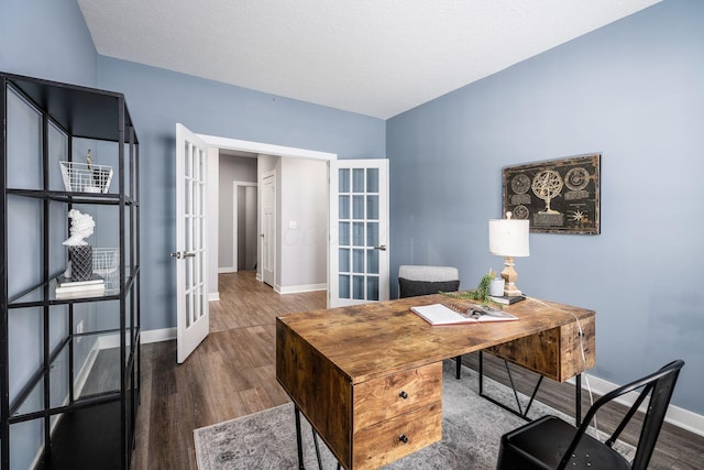 office featuring dark hardwood / wood-style flooring and french doors