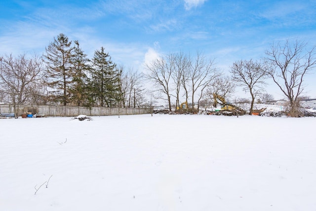 view of yard layered in snow