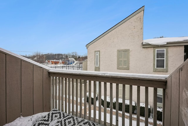 view of snow covered deck