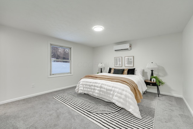 bedroom featuring a wall mounted air conditioner and light carpet