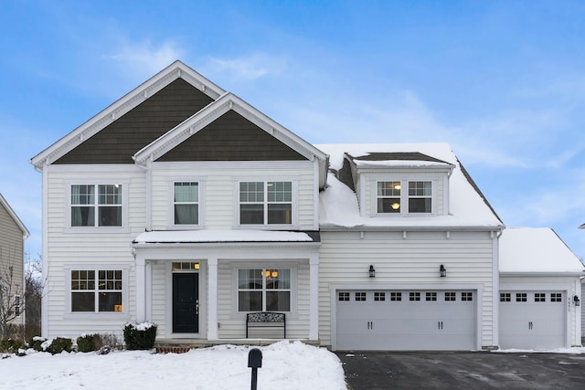 view of front of home with a garage