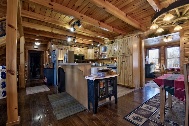 kitchen with wood walls, wooden ceiling, dark hardwood / wood-style floors, appliances with stainless steel finishes, and beam ceiling