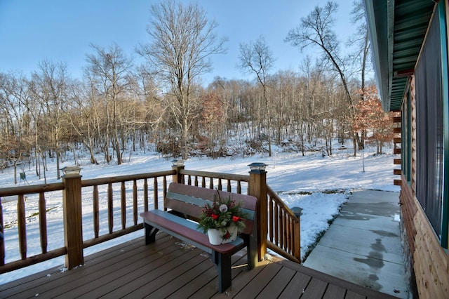 view of snow covered deck