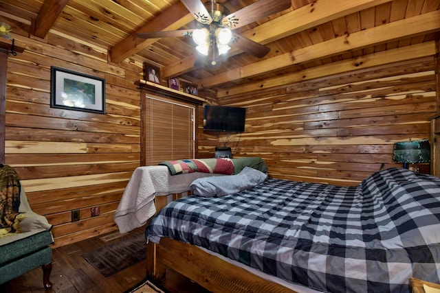 bedroom with wood walls, wooden ceiling, hardwood / wood-style flooring, ceiling fan, and beamed ceiling