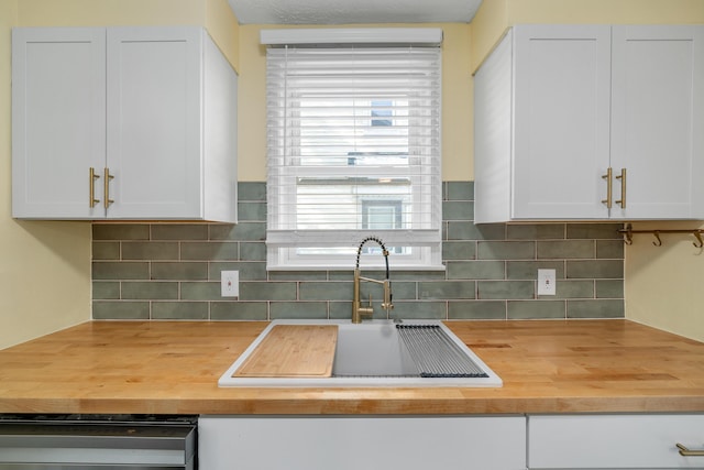 kitchen with white cabinets and sink