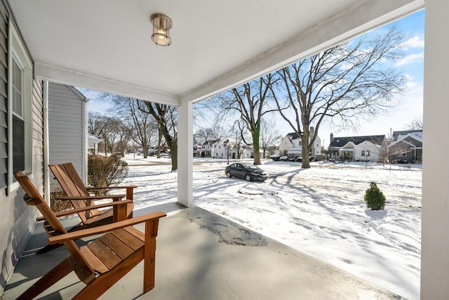 view of snow covered patio