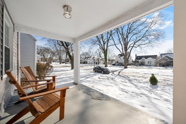 view of snow covered patio