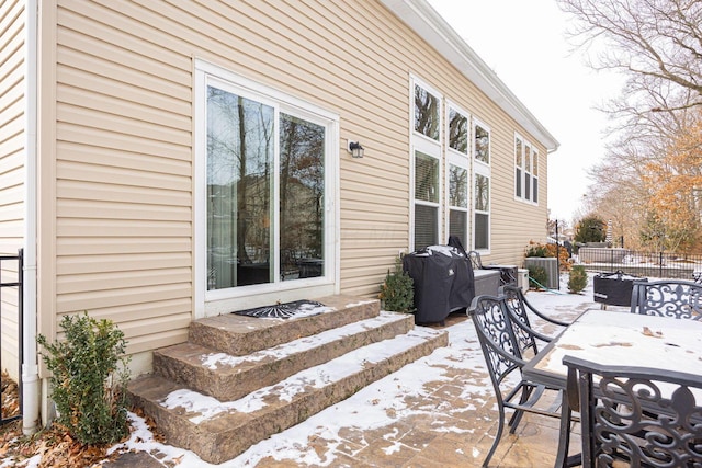 view of snow covered patio