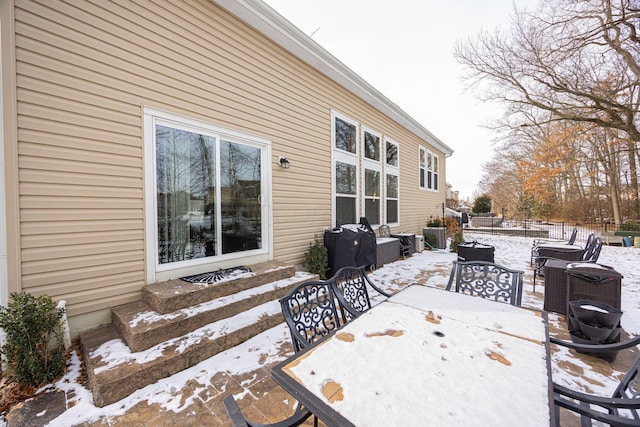 view of snow covered patio