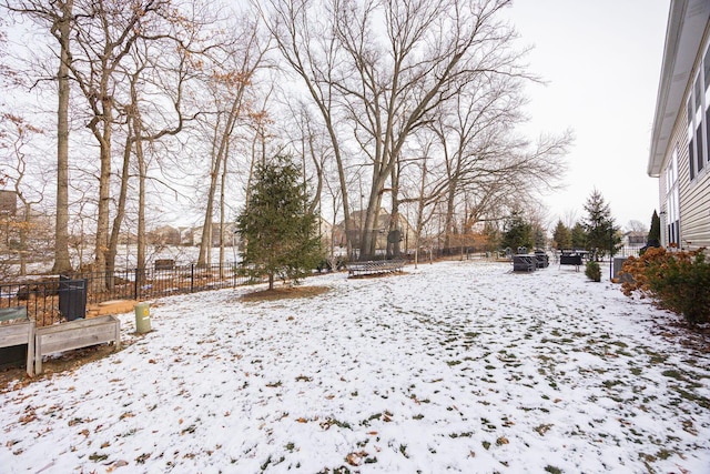 view of yard covered in snow