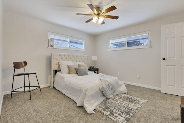 bedroom with ceiling fan and carpet flooring