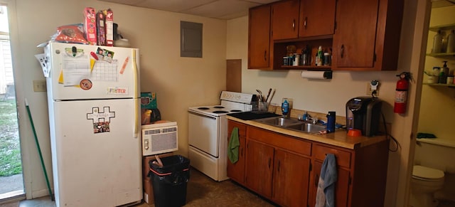 kitchen featuring sink, white appliances, electric panel, and plenty of natural light