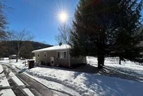 view of snow covered property