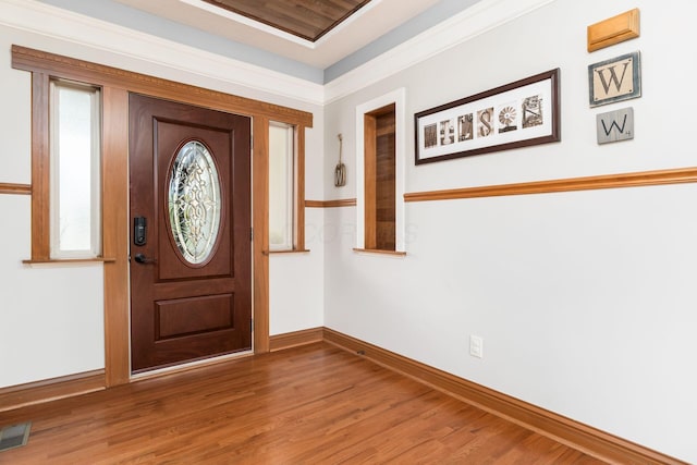 foyer entrance with hardwood / wood-style flooring