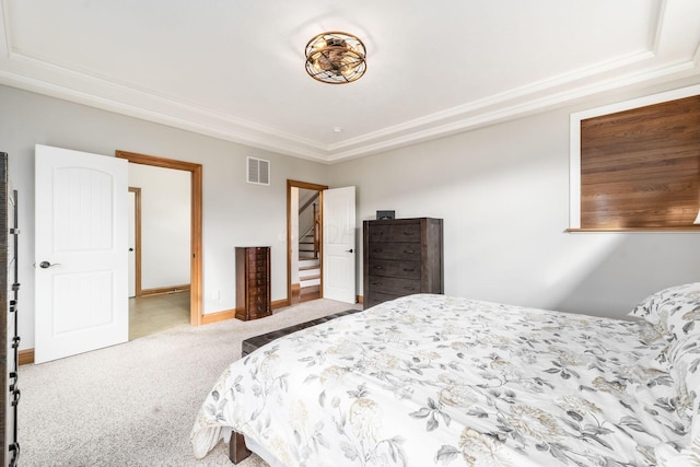 carpeted bedroom featuring ornamental molding