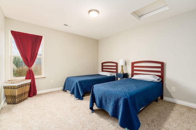 bedroom featuring carpet