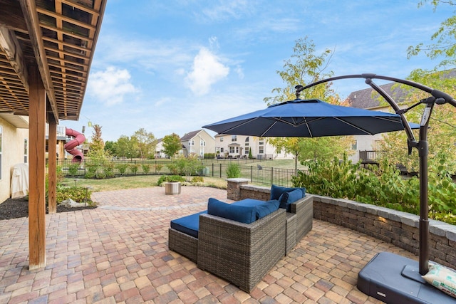 view of patio featuring a playground