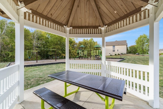 view of patio / terrace with a gazebo and a playground