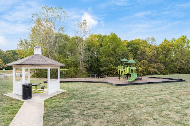 exterior space with a gazebo, a playground, and a lawn