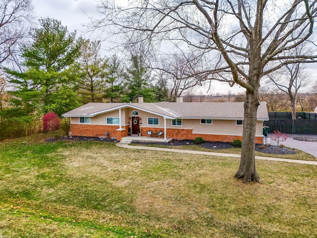 ranch-style house with a front yard