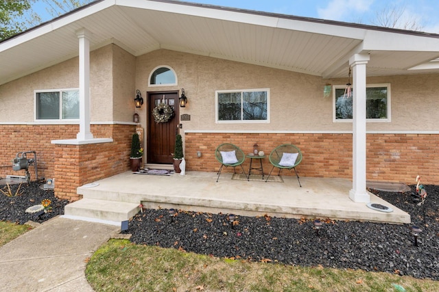 entrance to property with a porch