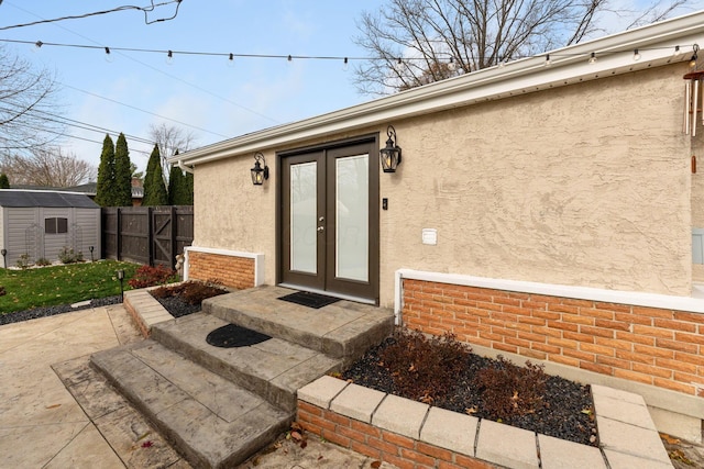 doorway to property featuring french doors