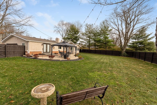 view of yard with a gazebo and a patio area