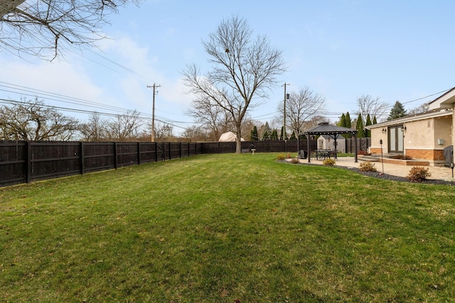 view of yard with a gazebo and a patio