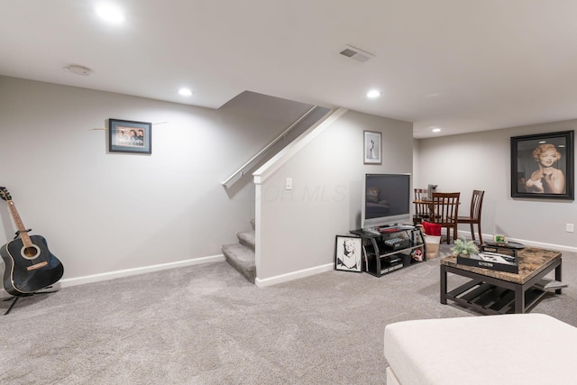 living room featuring light colored carpet