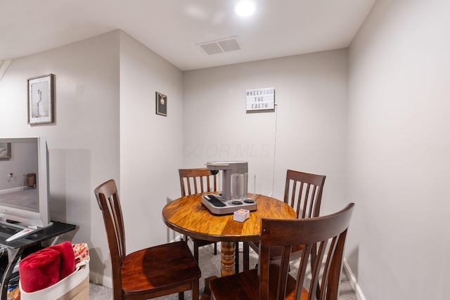 dining area featuring carpet floors