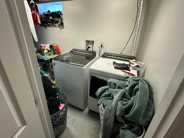 laundry room featuring washing machine and dryer