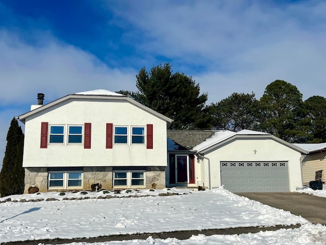 split level home with a garage