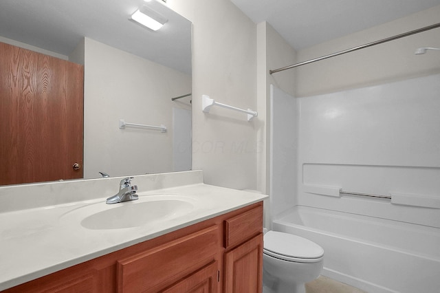 full bathroom with vanity, bathtub / shower combination, and toilet