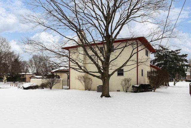 view of snow covered property