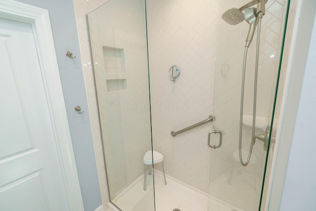 bathroom featuring walk in shower