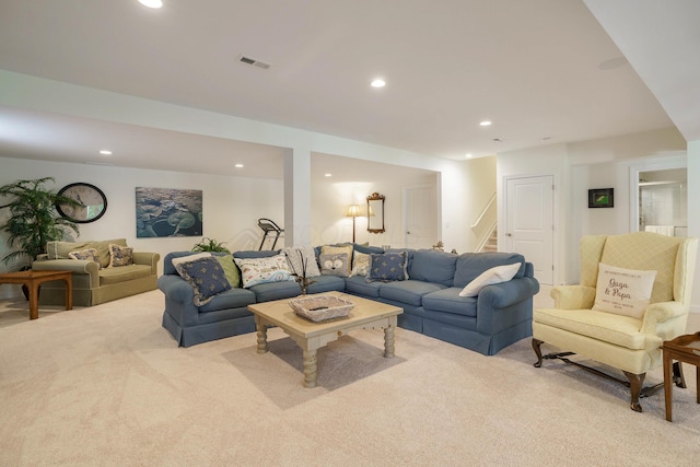 living room featuring light colored carpet