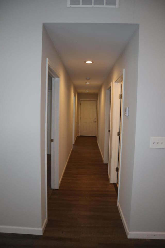 hall featuring dark hardwood / wood-style floors